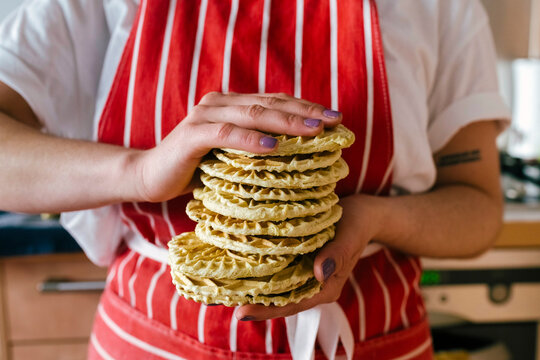Hands hold a Stack of Cookies. Close up 