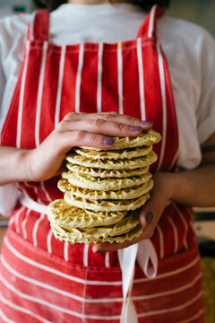 Hands hold a Stack of Cookies. Close up 