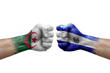 Two hands punch to each others on white background. Country flags painted fists, conflict crisis concept between algeria and el salvador