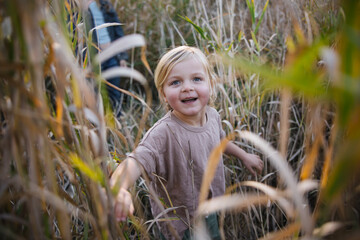 Little girl full of wonder outside.
