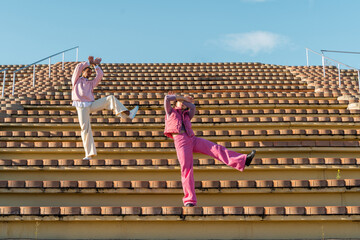 Dancer friends performing on outdoor tier