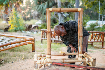 Man working with wood in countryside