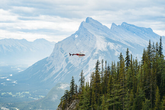 Helicopter in front of Mount Rundle