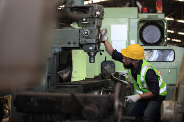  engineer on site working for production or maintenance  big machine industry in factory