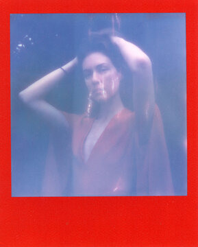 a dreamy woman in red dress