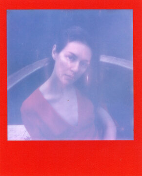 a dreamy woman near a swimming pool