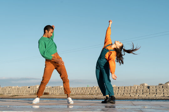 Cool friends listening to music and dancing