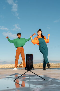 Cool friends dancing and recordin with phone