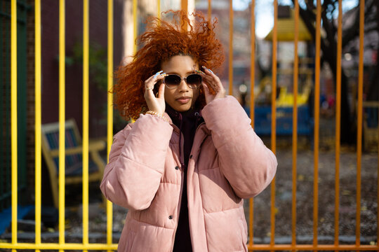 Young woman with sunglasses in winter