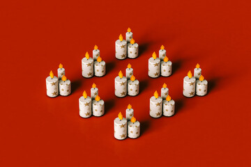 Cartoon Christmas candles with golden stars