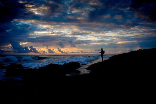 Fisherman at sunrise in Florida