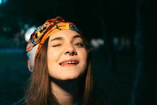 Joyful Teen Girl With Cuban Style Portrait At Night