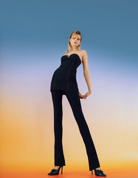 Fashion Top Model In Front Of Gradient Background