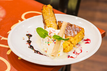 Pastel de choclo is a South American dish prepared with a baked paste of tender corn kernels and, depending on where it is prepared, it is sweet or savory, with or without filling.