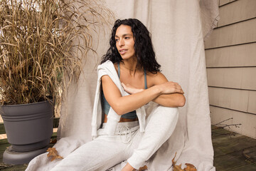 Woman in cozy white leisure set smiling