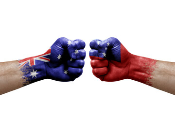 Two hands punch to each others on white background. Country flags painted fists, conflict crisis concept between australia and samoa