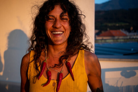 A hot girl with a chilli necklace 