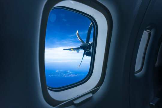 ATR machine and view of Lan Island from plane window, Pattaya, Thailand.