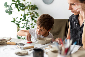 Parent And Child Making Ceramics