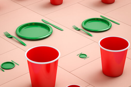 Different glasses and plates with plastic cutlery