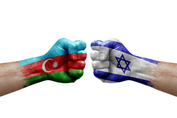 Two hands punch to each others on white background. Country flags painted fists, conflict crisis concept between azerbaijan and israel