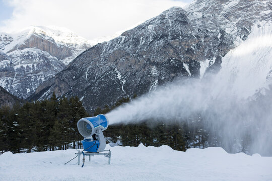 snow gun machine producing artificial snow