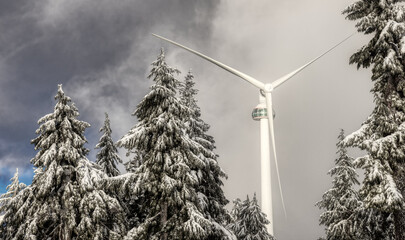 Wind Turbine on top of Grouse Mountain during cloudy winter season. Located in North Vancouver, British Columbia, Canada.