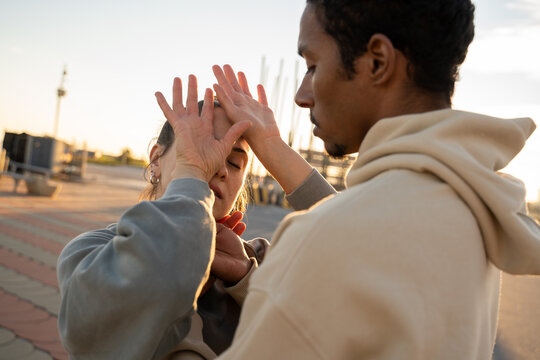 Close-up portrait of expressive couple