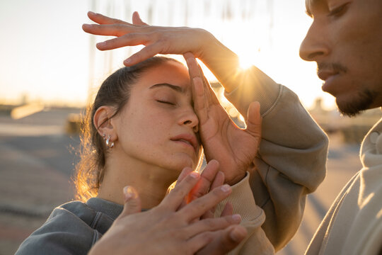 Close-up portrait of expressive couple