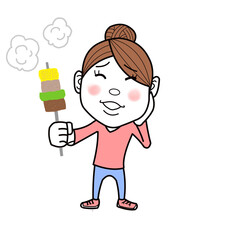 串焼きを食べるキャンプ女子