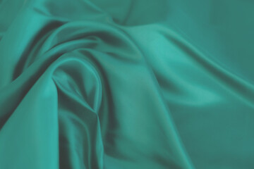soft focus of green fabric texture background, abstract, closeup texture of cloth