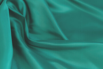 soft focus of green fabric texture background, abstract, closeup texture of cloth
