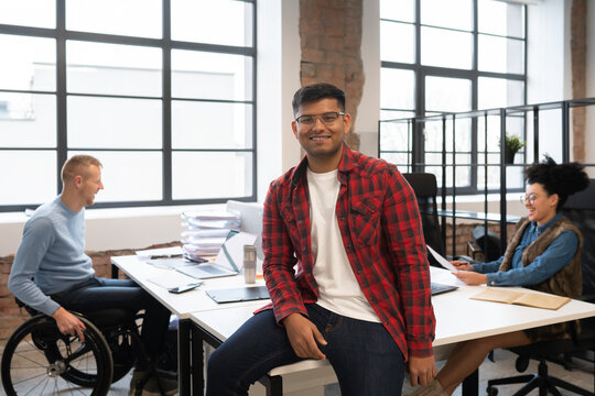 Informal Portrait Of Indian Man At Office