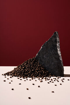 A pile of roasted coffee on a table