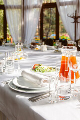 Table setting. Restaurant Served table for party in light neutral colors