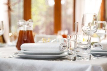 Table setting. Restaurant Served table for party in light neutral colors