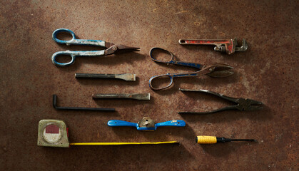 Arrangement  of DIY Tools Shot on Rust Background 