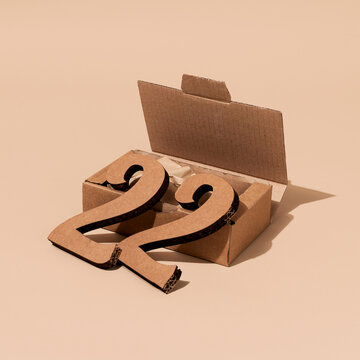 cardboard number 22 out of a box