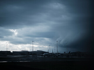airplane window view  of a airport tarmac