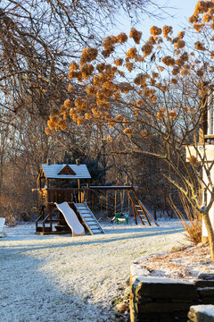  winter snow on Swing set in backyard 