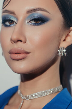 Beauty portrait with blue eye shadow 