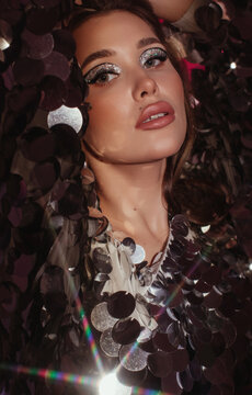 Beauty woman and silver sequins
