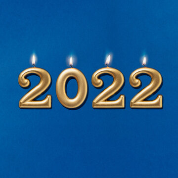 2022 New Year's Candles On Classic Blue Background