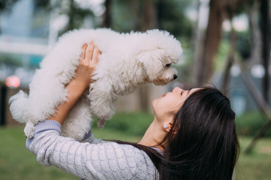 Woman hugging a dog