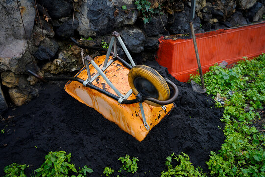 A yellow wheelbarrow.