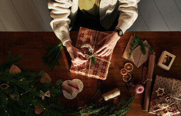 Woman wrapping Christmas present
