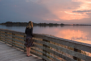 Woman watching sunset