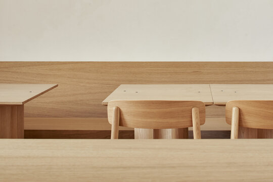 Wooden tables and chairs in restaurant