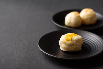 Thai mooncake or Chinese pastry on black background