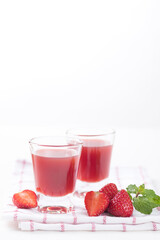 Strawberry juice in glass with fresh strawberry fruit on white background, Healthy drink